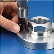 Step 3: Tap the locking pins down with a hammer